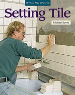 Cover of Setting Tile book with person installing ceramic tiles on wall using trowel and adhesive