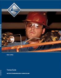 Cover of Nccer Basic Safety Trainee Guide showing a construction worker wearing a hard hat and safety glasses