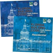 Covers of Florida Building Code Sixth Edition 2017 and Residential Edition with state capitol line drawings on blue backgrounds