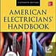 Cover of American Electricians Handbook showing electrician's gloved hand holding tool with yellow and blue background
